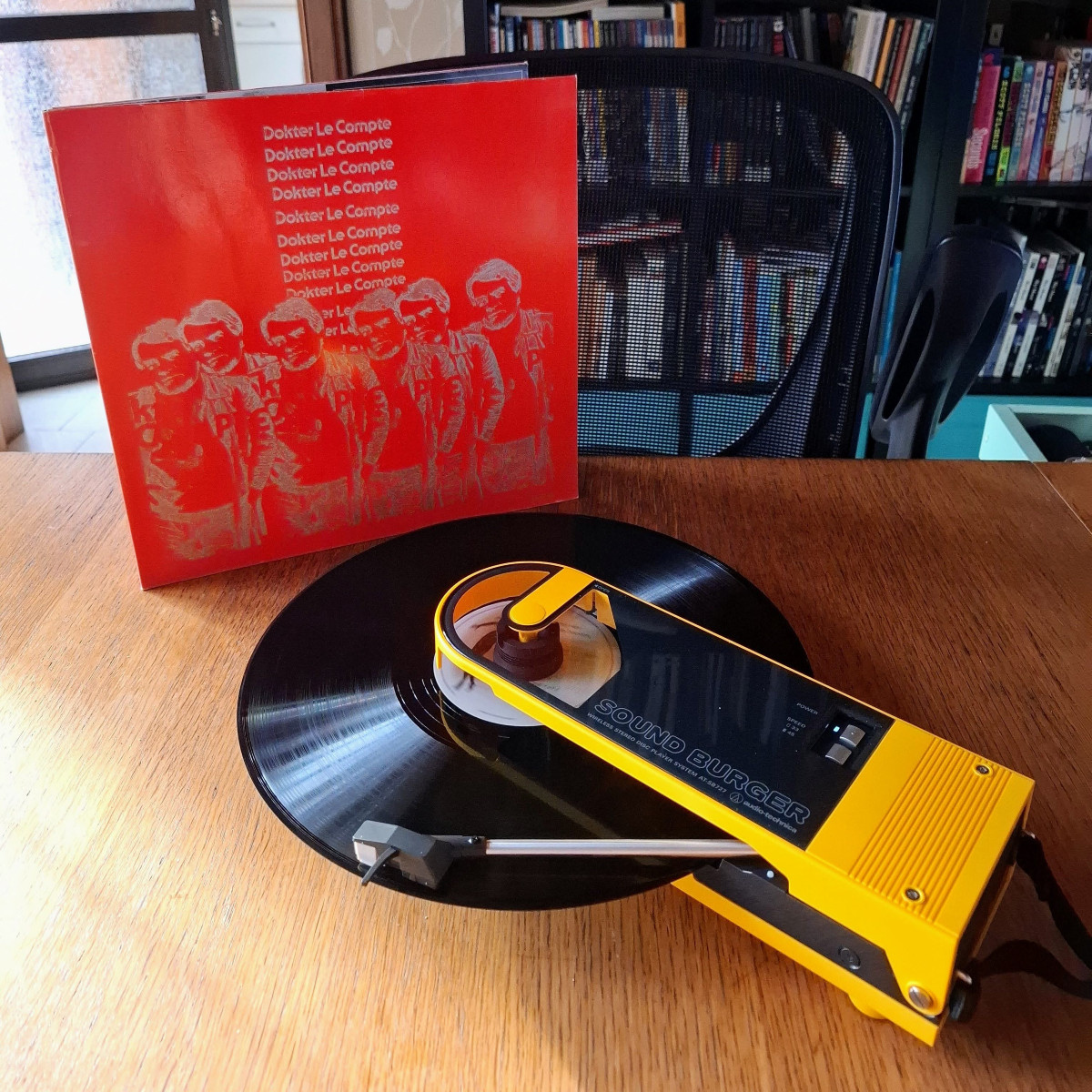 yellow Sound Burger record player with record